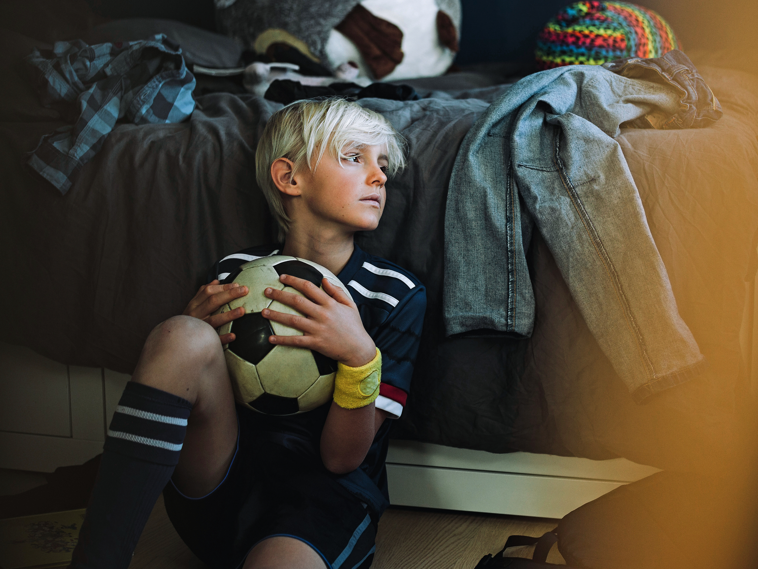 Kid with football ball