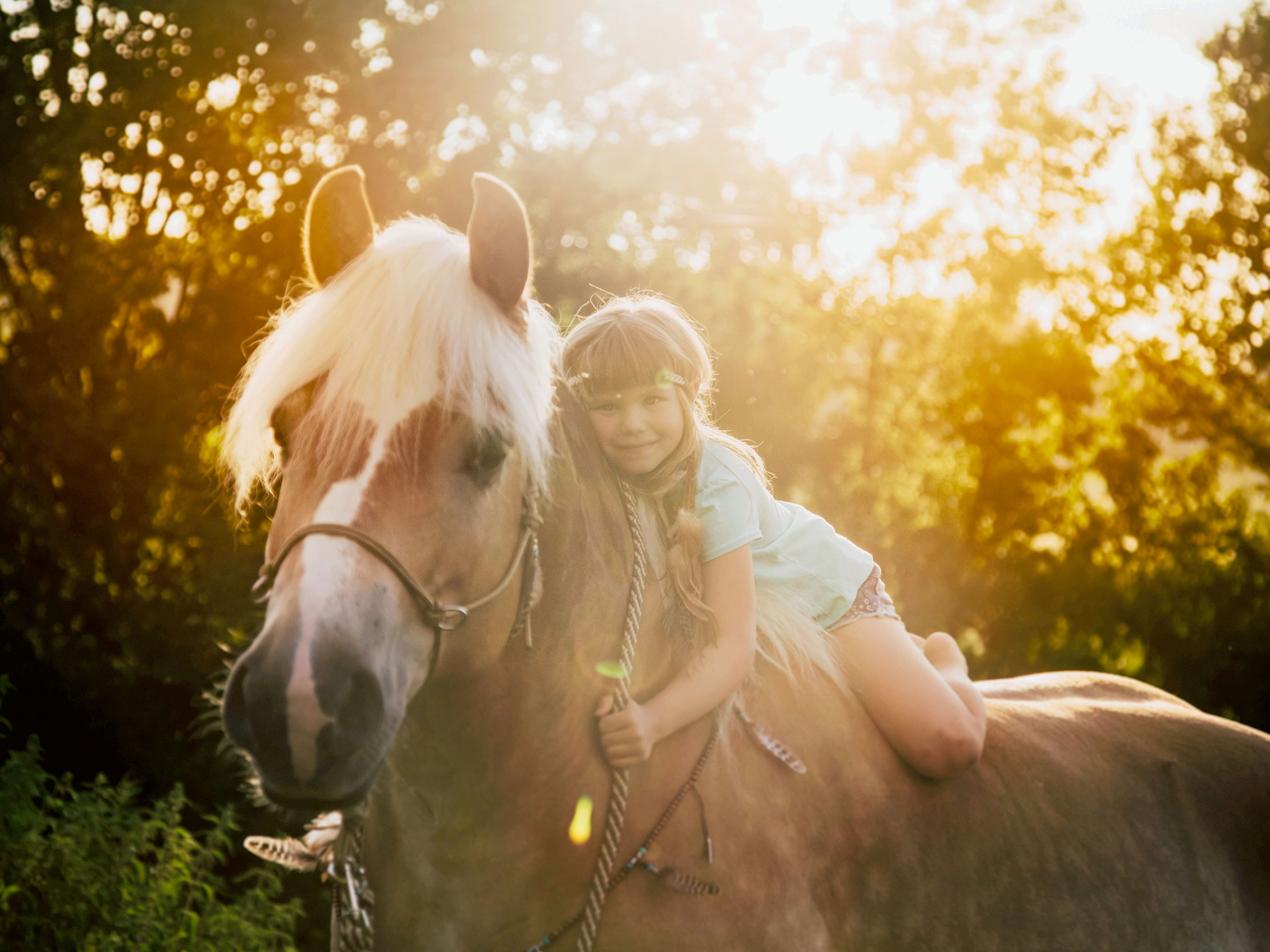 Kind auf Pferd