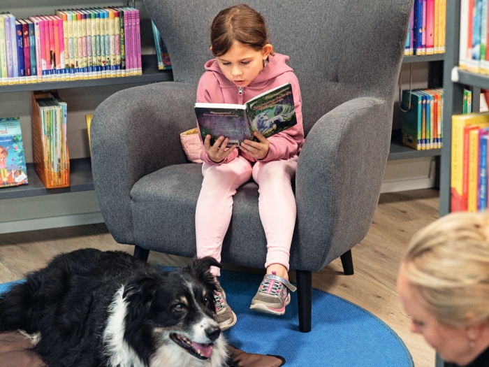 A child with a dog